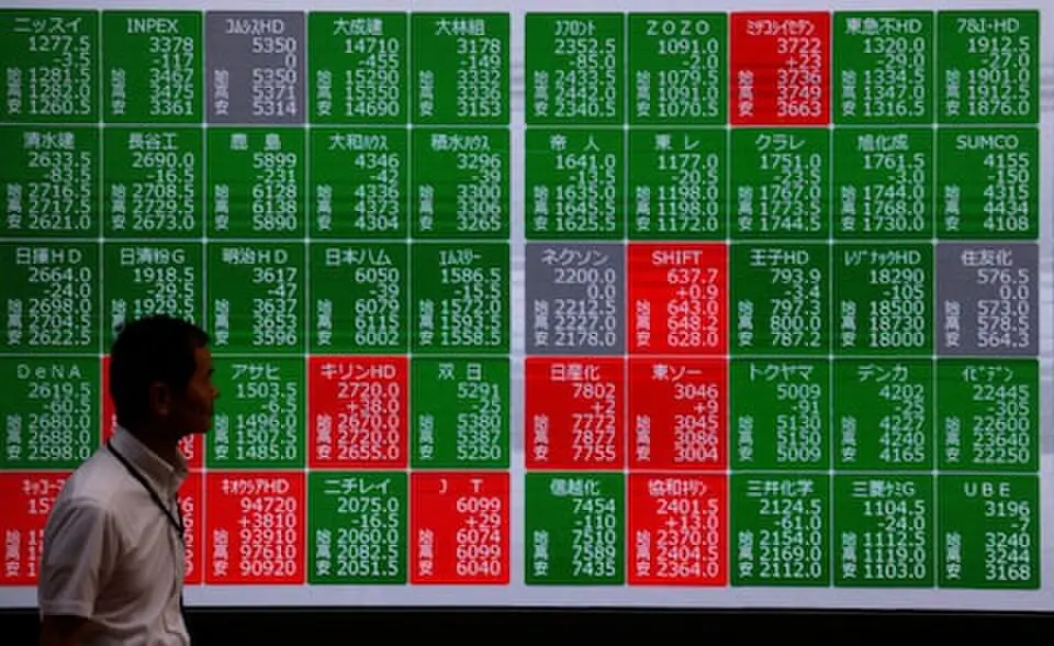 Stocks trade cautiously in Asia, Brent off six-month top